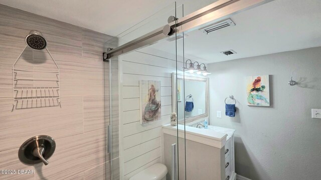 1275 Ocean Shore Blvd Unit 206, Ormond Beach, FL 32176 - full bath featuring vanity, a tile shower, and toilet
