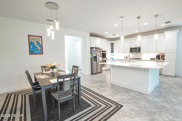 703 Coral Reef Way, Daytona Beach, FL 32124 - dining space with recessed lighting and baseboards
