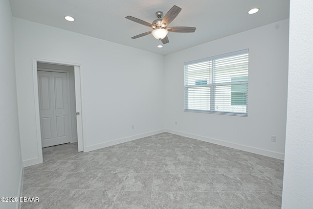 703 Coral Reef Way, Daytona Beach, FL 32124 - empty room with a ceiling fan, recessed lighting, and baseboards