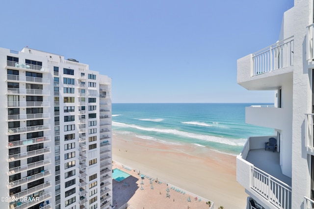 property view of water featuring a beach view