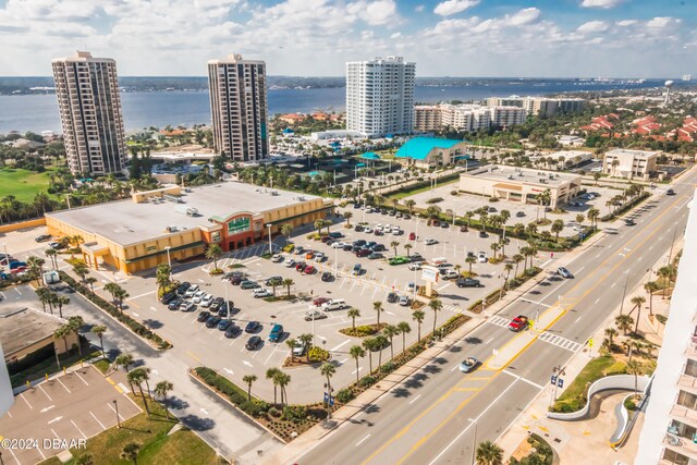 drone / aerial view with a water view