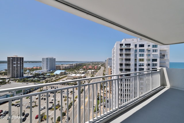 balcony featuring a water view