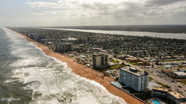 drone / aerial view with a view of the beach and a water view