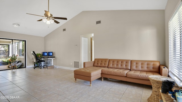 living room featuring ceiling fan, light tile patterned floors, and high vaulted ceiling