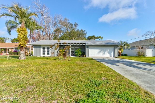 single story home featuring a garage and a front yard