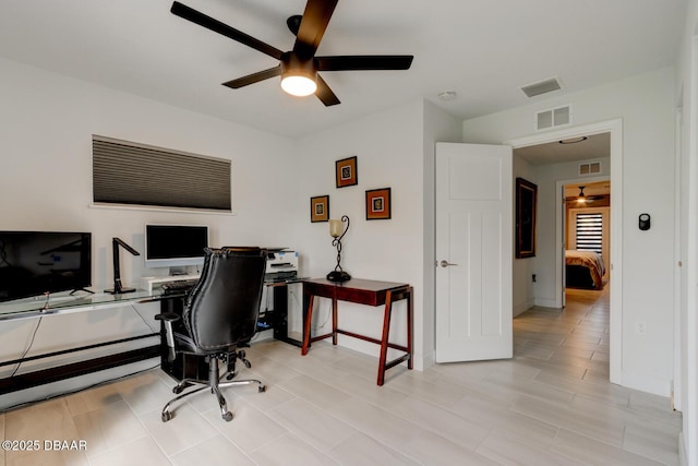 home office with ceiling fan