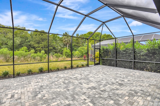 view of patio / terrace with a lanai