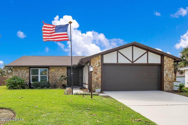 4 Sea Hawk Dr, Ormond Beach, FL 32176 - view of front of house featuring stone siding, driveway, and a front lawn