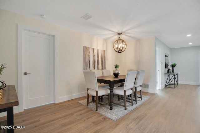 4 Sea Hawk Dr, Ormond Beach, FL 32176 - dining room featuring light wood finished floors, a chandelier, and recessed lighting