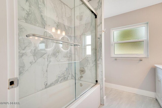 4 Sea Hawk Dr, Ormond Beach, FL 32176 - bathroom with bath / shower combo with glass door, vanity, and marble finish flooring