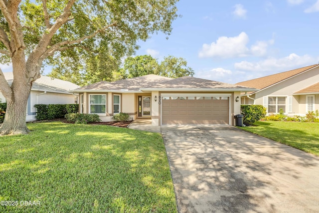 620 Middlebury Loop, New Smyrna Beach, FL 32168 - ranch-style house with a garage, stucco siding, driveway, and a front yard