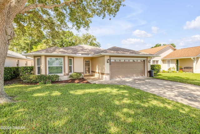 620 Middlebury Loop, New Smyrna Beach, FL 32168 - single story home with an attached garage, stucco siding, a front lawn, and driveway
