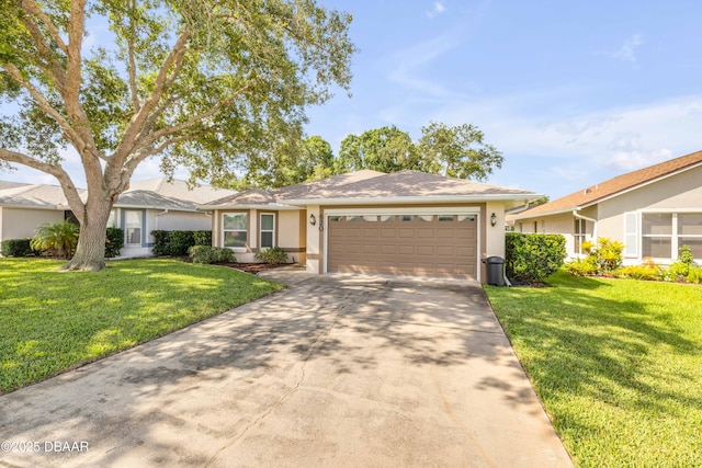 620 Middlebury Loop, New Smyrna Beach, FL 32168 - single story home with an attached garage, stucco siding, concrete driveway, and a front yard