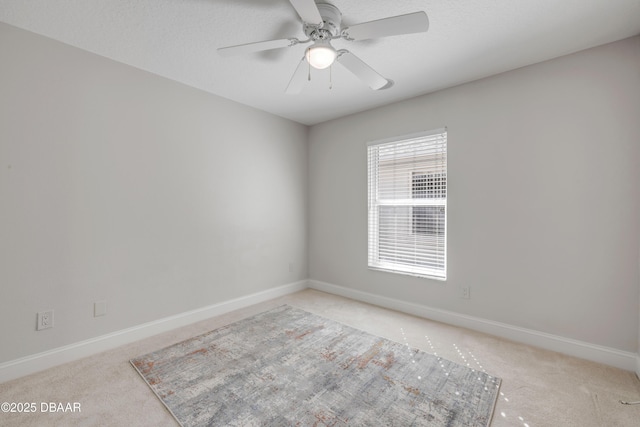 620 Middlebury Loop, New Smyrna Beach, FL 32168 - spare room featuring carpet and a ceiling fan