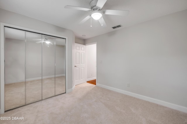 620 Middlebury Loop, New Smyrna Beach, FL 32168 - unfurnished bedroom with carpet floors, a closet, and ceiling fan
