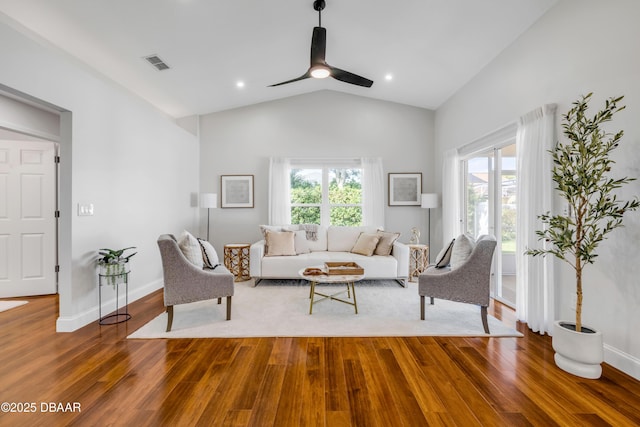 620 Middlebury Loop, New Smyrna Beach, FL 32168 - living room with healthy amount of natural light, ceiling fan, wood finished floors, and high vaulted ceiling