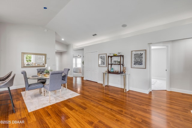 620 Middlebury Loop, New Smyrna Beach, FL 32168 - dining room with lofted ceiling and wood finished floors