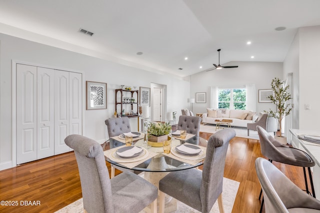 620 Middlebury Loop, New Smyrna Beach, FL 32168 - dining space with vaulted ceiling, light wood-style floors, ceiling fan, and recessed lighting