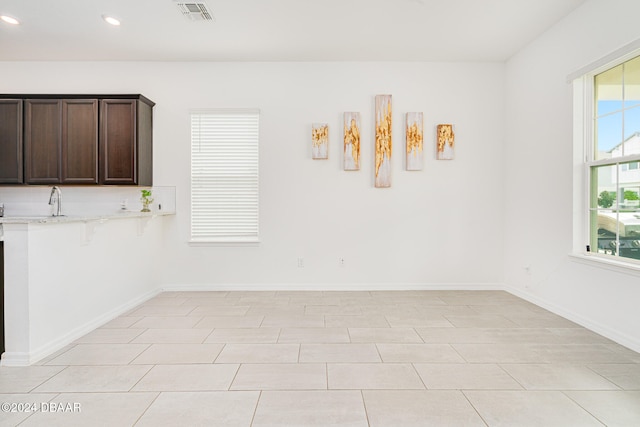 view of tiled spare room