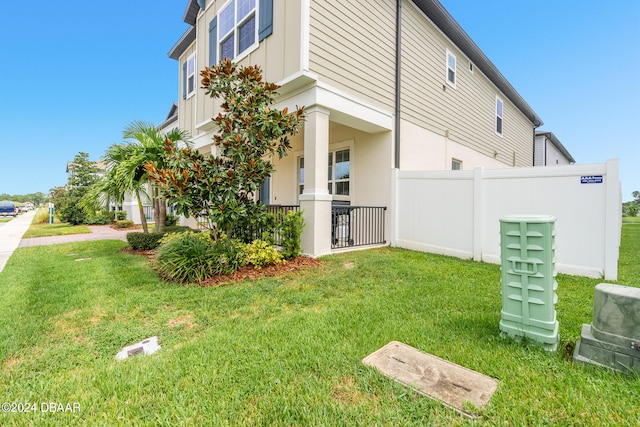 view of property exterior featuring a yard