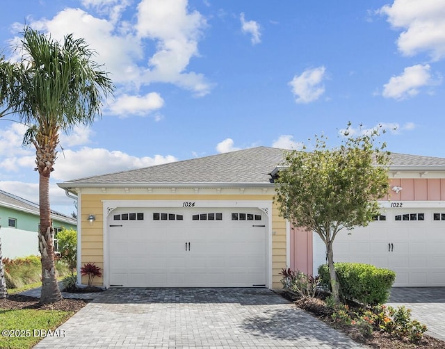 1024 Sea Shell Ct, Daytona Beach, FL 32124 - garage featuring decorative driveway