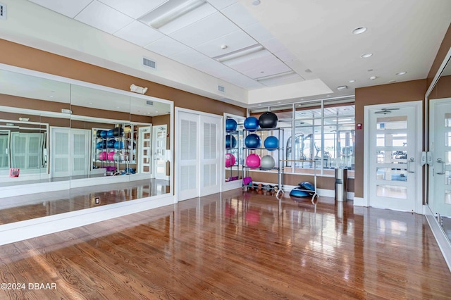 exercise area featuring hardwood / wood-style floors