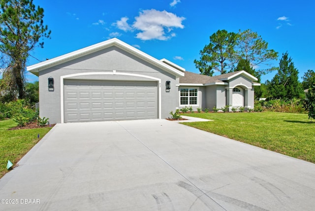 ranch-style house featuring an attached garage, driveway, a front yard, and stucco siding