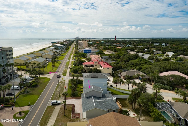 aerial view featuring a view of the beach and a water view