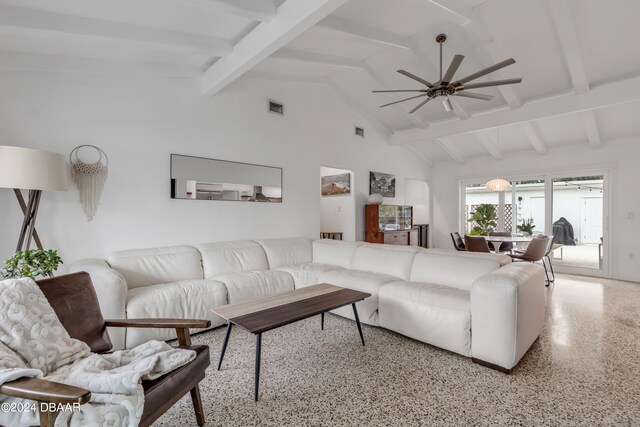 living room with ceiling fan and vaulted ceiling with beams