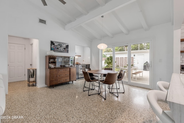 dining room featuring high vaulted ceiling, ceiling fan, and beam ceiling