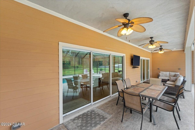 view of patio / terrace with ceiling fan