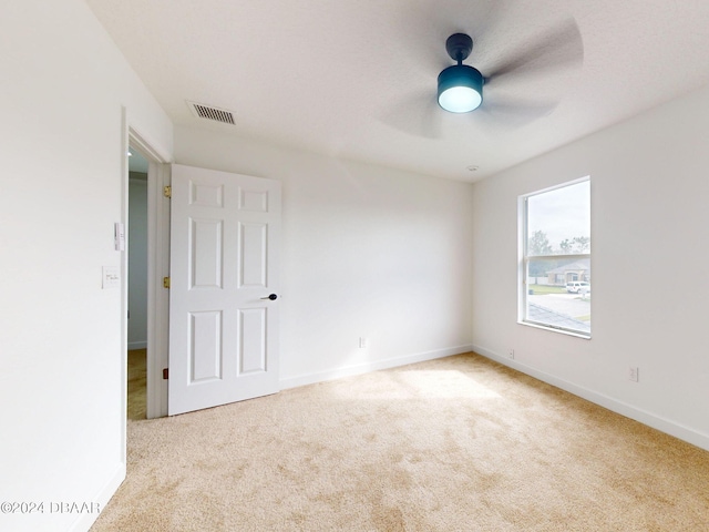 5336 Georgia Peach Ave, Port Orange, FL 32128 - carpeted spare room with baseboards and a ceiling fan