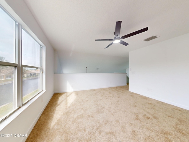 5336 Georgia Peach Ave, Port Orange, FL 32128 - carpeted spare room with ceiling fan, lofted ceiling, and baseboards
