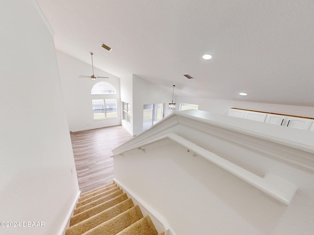 5336 Georgia Peach Ave, Port Orange, FL 32128 - staircase with vaulted ceiling, ceiling fan, baseboards, recessed lighting, and wood finished floors
