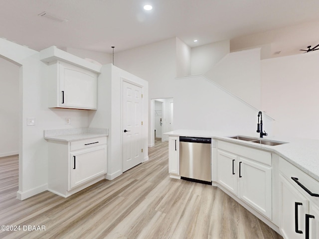 5336 Georgia Peach Ave, Port Orange, FL 32128 - kitchen featuring dishwasher, a sink, light wood-type flooring, light countertops, and recessed lighting