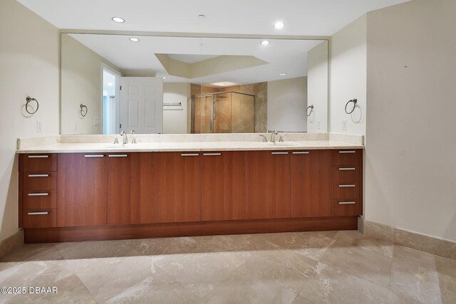 231 Riverside Dr Unit 1801, Daytona Beach, FL 32117 - bathroom featuring recessed lighting, a shower stall, and vanity