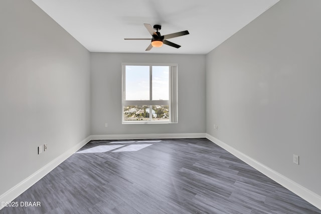 231 Riverside Dr Unit 1801, Daytona Beach, FL 32117 - spare room with ceiling fan, dark wood-style flooring, and baseboards
