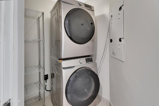 231 Riverside Dr Unit 1801, Daytona Beach, FL 32117 - clothes washing area featuring laundry area and stacked washer / dryer