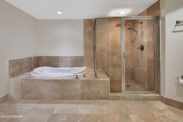 231 Riverside Dr Unit 1801, Daytona Beach, FL 32117 - full bathroom with a stall shower and a bath