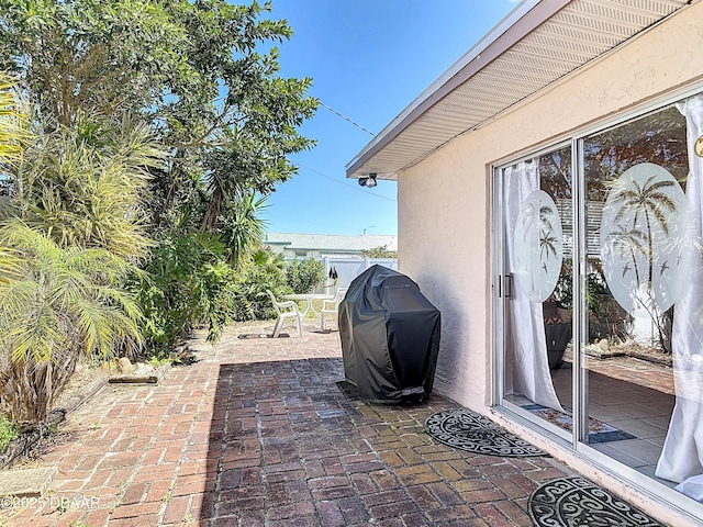 413 Frances Ter, Daytona Beach, FL 32118 - view of patio featuring grilling area