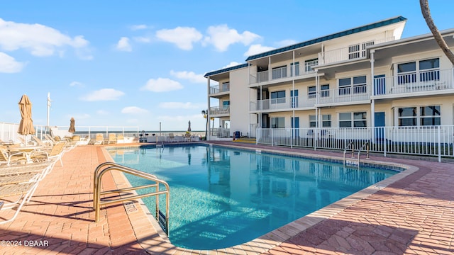 view of swimming pool featuring a patio