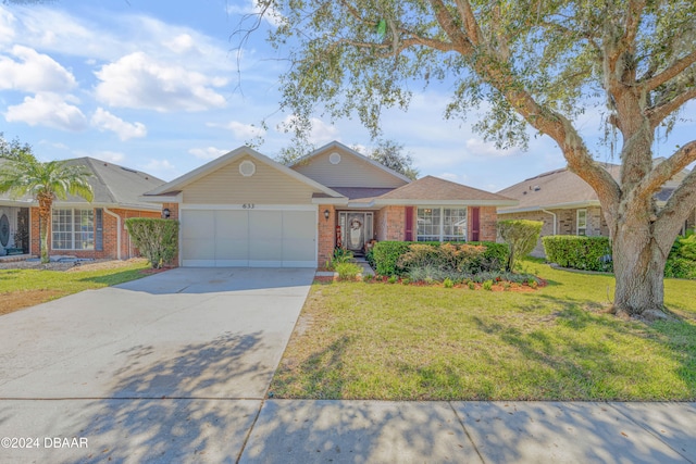 single story home with a garage and a front yard