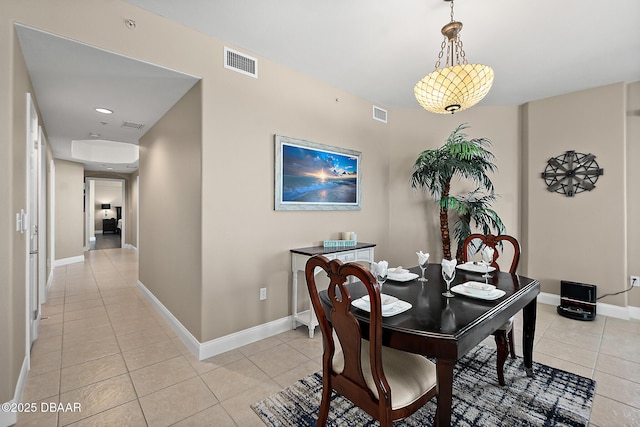 dining room with light tile patterned flooring