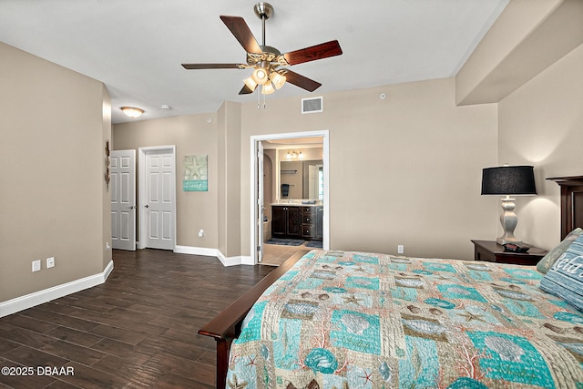 bedroom featuring connected bathroom, dark hardwood / wood-style flooring, and ceiling fan