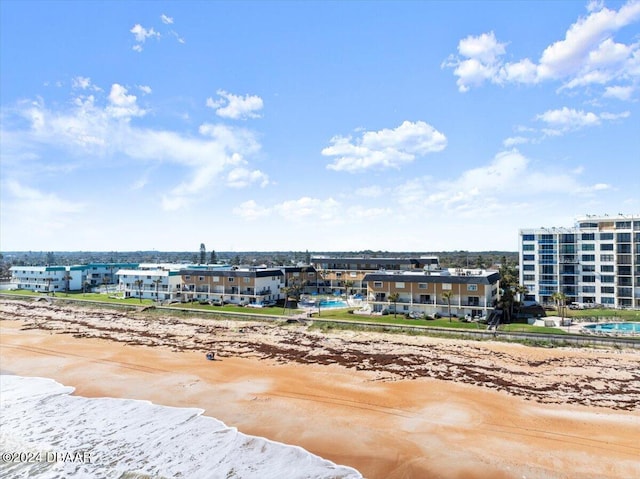 birds eye view of property featuring a view of the beach