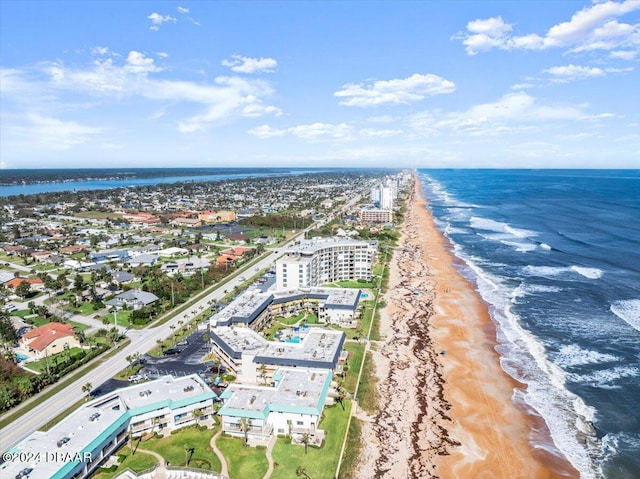 aerial view featuring a water view and a view of the beach