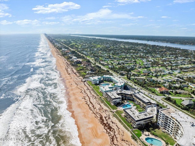 aerial view featuring a water view and a beach view