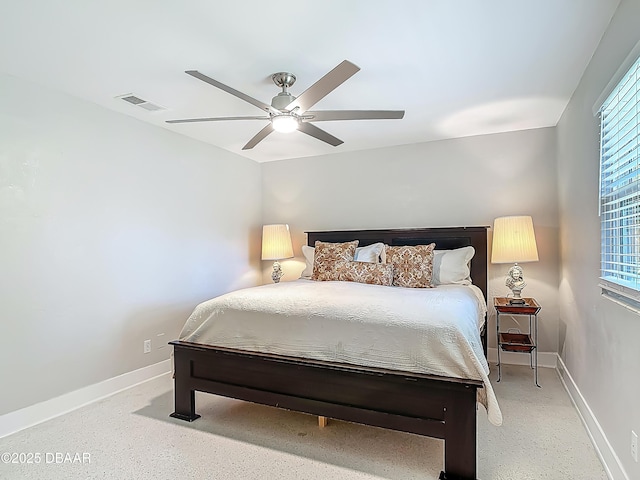 bedroom with multiple windows, baseboards, and ceiling fan