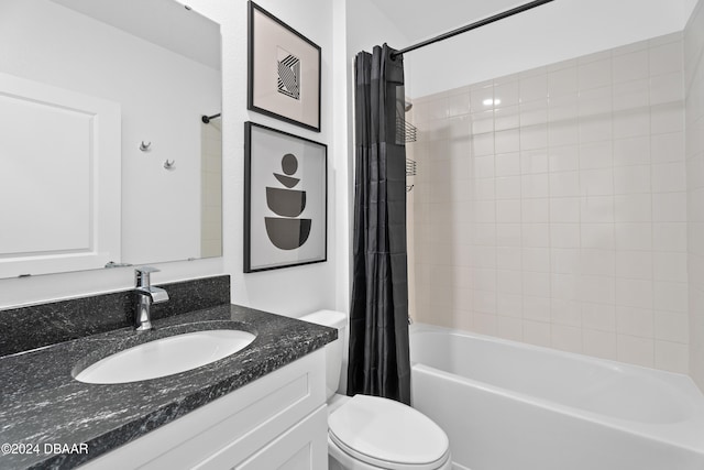 full bathroom featuring vanity, shower / tub combo, and toilet