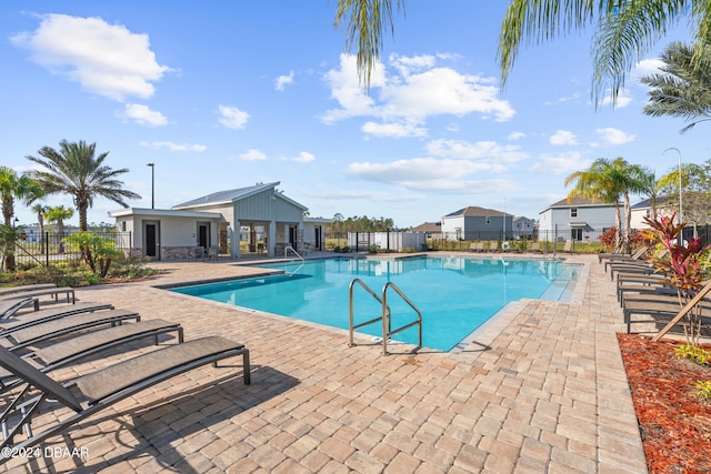 view of pool featuring a patio